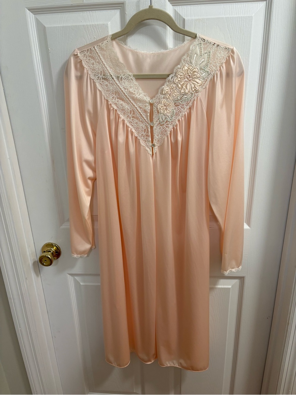 vintage Shadowline peignoir robe is made of light pink/ peach nylon.